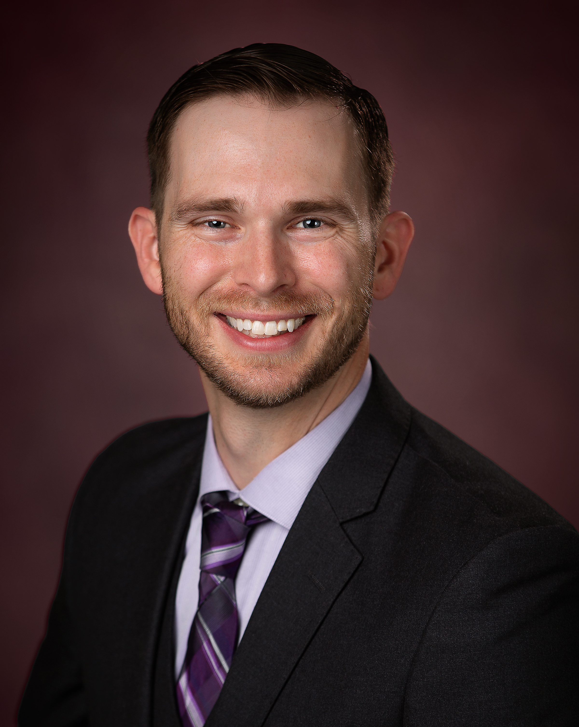 Headshot of Dr. A Tyler Haussler, MD, internal Medicine Physician at Family Medical Specialties